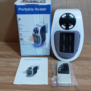 NEW In Box Plug portable electric heater
